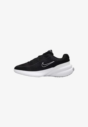 Schwarze Sportlinien mit Netzoberteil, weißer Sohle und auffälligem Swoosh-Logo. Verfügt über eine abgerundete Form und strukturierte Akzente auf der Oberseite.