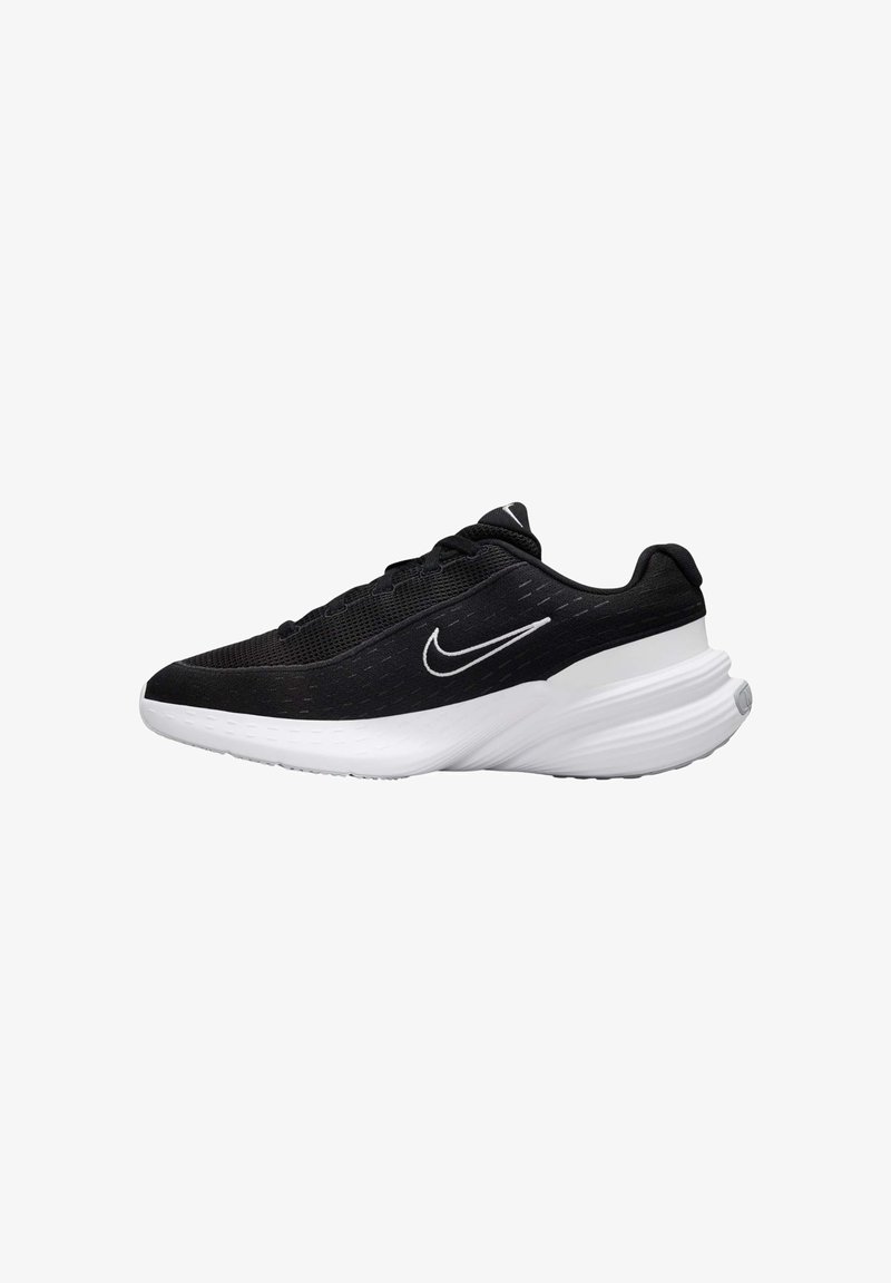 Schwarze Sportlinien mit Netzoberteil, weißer Sohle und auffälligem Swoosh-Logo. Verfügt über eine abgerundete Form und strukturierte Akzente auf der Oberseite.