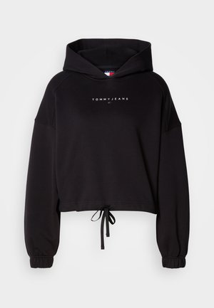 Sudadera corta negra de tejido suave, con un dobladillo con cordón, puños fruncidos y un logo blanco de "TOMMY JEANS" en el frente.