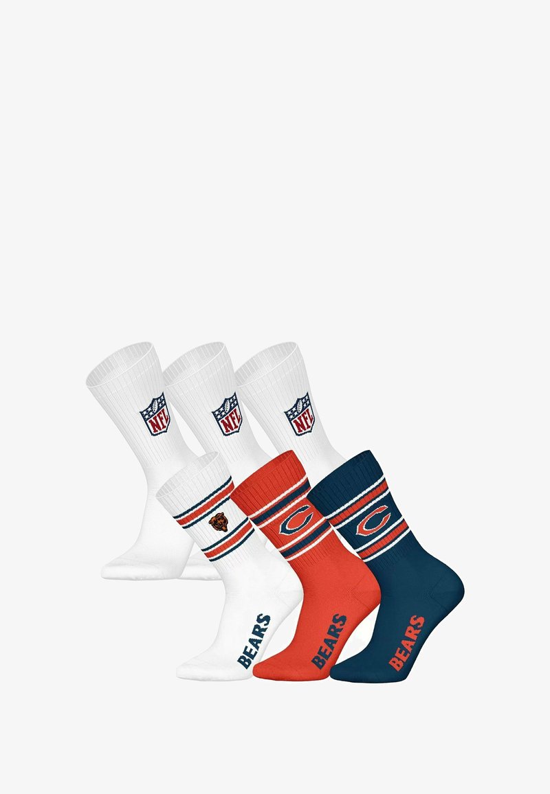 Cuatro pares de calcetines con una mezcla de colores blanco, naranja y azul marino. Incluye el logo de la NFL, el texto "Bears" y acentos a rayas. Mezcla de algodón.