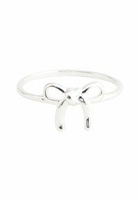 Silver ring with a bow design; smooth, polished finish; thin band; rounded edges; decorative knot at center of the bow.