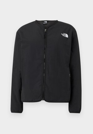 Giacca nera con zip frontale e collo rotondo, con il logo The North Face in bianco sul lato sinistro del petto. Tessuto leggero, maniche lunghe, senza motivi.