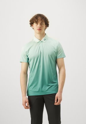 Short-sleeve polo shirt in gradient teal, featuring a collared neck, subtle logo on the collar, and a smooth, lightweight fabric.