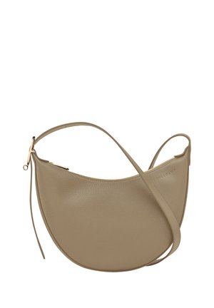 Taupe half-moon leather shoulder bag with gold zipper and adjustable strap on a white background.
