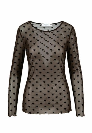 Haut noir transparent à manches longues avec encolure ronde et motif petits cœurs noirs sur tout le tissu transparent.