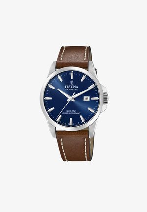 Orologio al quarzo con quadrante blu, lunetta argentata e cinturino in pelle marrone, dotato di indici bianchi e finestrella per la data. Resistente all'acqua fino a 10 bar.