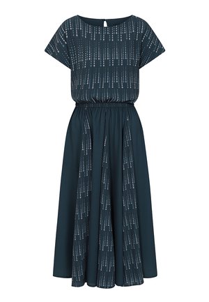 Tmavomodrozelené midi šaty s voľným strihom, krátkymi rukávmi, elastickým pásom a vertikálnym vzorom bielych bodiek. Detail v tvare kľúčovej dierky na chrbte.