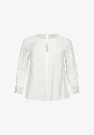 Hvid langærmet bluse med rund halsudskæring, nøglehul detalje og berigede manchetter med en klump af små nitter. Blødt stoftekstur.