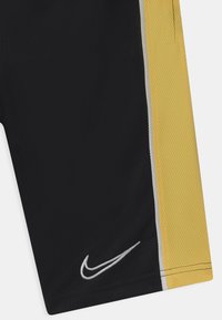Nike Performance UNISEX - Kurze Sporthose - black/saturn gold/white