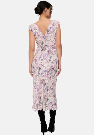 Floral midi dress in light fabric, featuring a V-back, cap sleeves, and ruffled hem. Colors include purple, green, and cream.