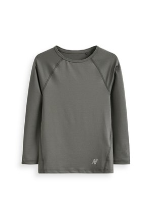 Langarmshirt in donkergrijs, gemaakt van zacht, ademend materiaal. Heeft een ronde hals en raglanmouwen. Subtiel logo in de hoek.