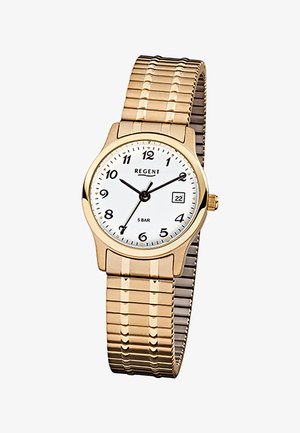 Montre bracelet dorée avec cadran blanc, chiffres arabes noirs, trois aiguilles noires, affichage de la date à 3 heures et bracelet métallique extensible.