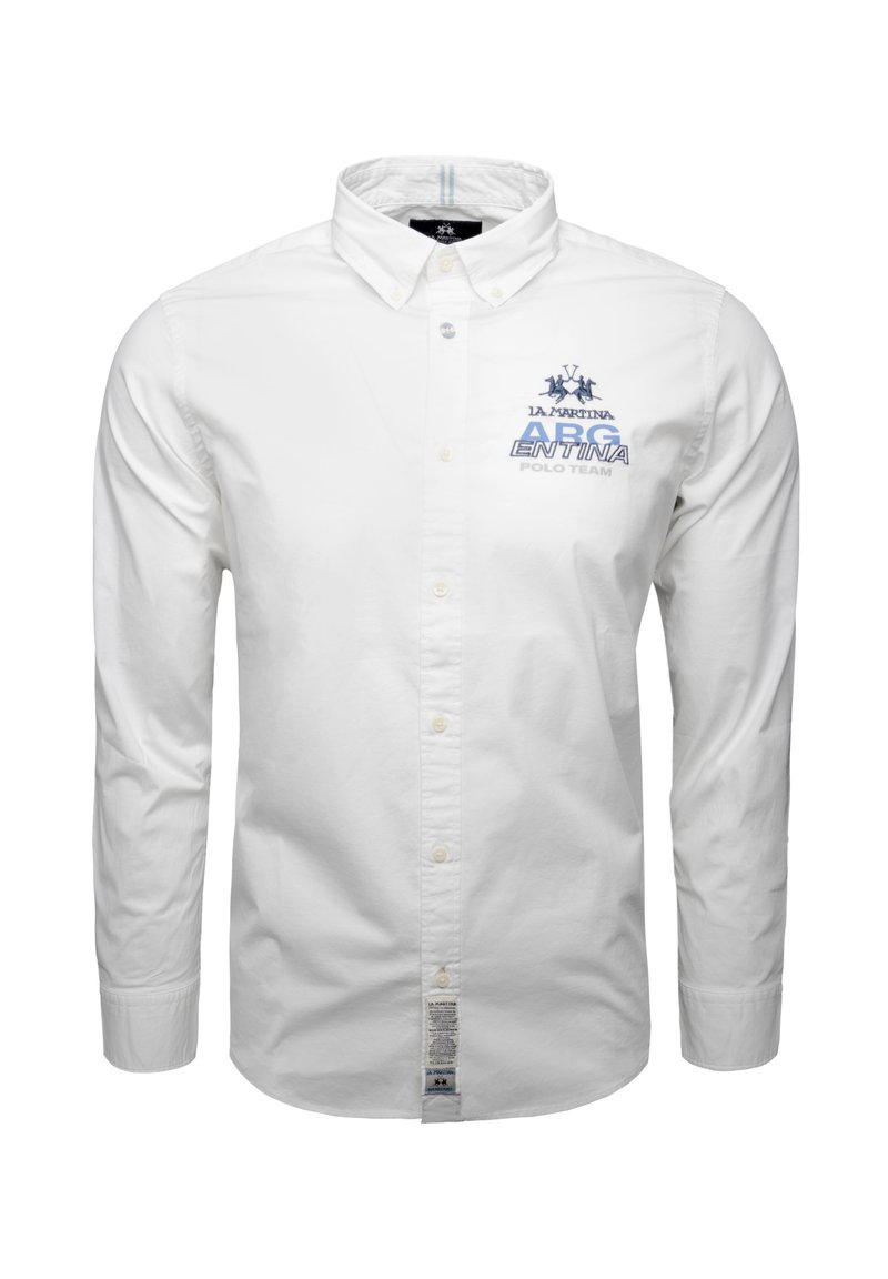 Camicia bianca a maniche lunghe con colletto button-down, con logo ricamato blu e testo "ARGENTINA POLO TEAM" sul lato sinistro del petto.