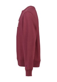 Maroon sweatshirt made of cotton blend, crewneck design, ribbed cuffs and hem, features a small logo detail on the lower side.
