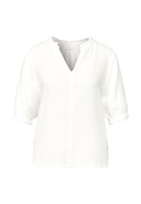 Blouse blanche texturée avec un décolleté en V, des manches courtes bouffantes et un col à volants. Tissu léger, coupe décontractée et motif légèrement froissé.