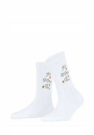 Calzini bianchi a coste con testo verde "It's Xmas Time" e tre piccole stelle dorate su ogni calzino.