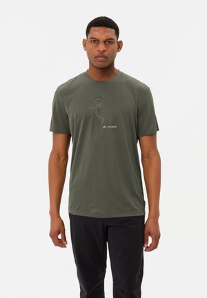 Green cotton t-shirt featuring a line drawing of mountains and a winding path. Short sleeves, round neckline, relaxed fit.