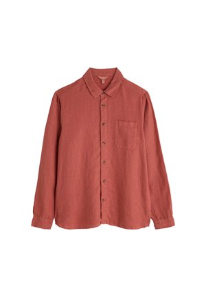 Rūdžių spalvos ilgomis rankovėmis marškiniai iš tekstūruotos medžiagos, turintys sagomis užsegamą priekinę dalį ir vieną krūtinės kišenę.