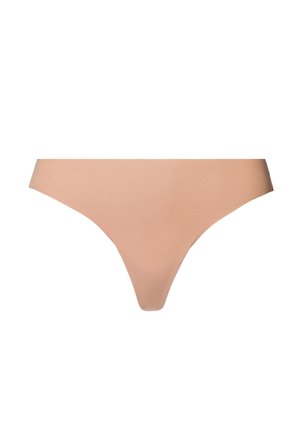 Saumaton alaston thong-alushousu, joka on valmistettu pehmeästä kankaasta. Siinä on minimalistinen muotoilu ja sileä pinta ilman näkyviä saumoja tai kuvioita.