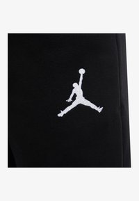 Jordan ESSENTIALS PANT UNISEX - Pantalones deportivos - black