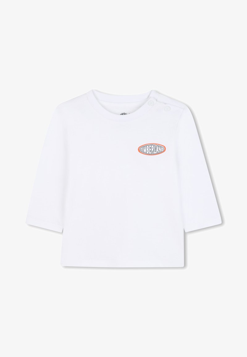 Witte longsleeve t-shirt van zacht katoen, met een ronde halslijn en twee drukknoopjes op de linkerschouder. Timberland-logo weergegeven.