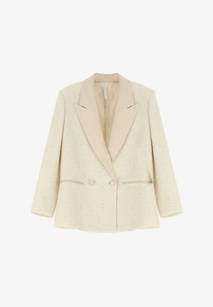 Blazer beige testurizzato con rever a picco di un beige chiaro a contrasto, chiusura a doppio bottone e due tasche laterali. Vestibilità sartoriale con spalle strutturate.