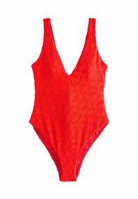 Costume da bagno intero rosso con scollo a V profondo, motivo testurizzato di forme di conchiglia in rilievo e silhouette aderente. Fodera interna liscia.