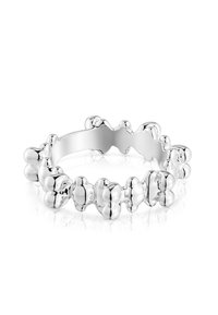 Srebrny pierścionek z falistym wzorem i zaokrąglonymi, bulwiastymi akcentami. Gładka, refleksyjna powierzchnia z polerowanym wykończeniem.