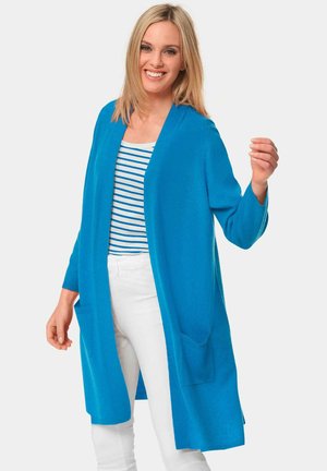 Türkiser Cardigan mit langem Design, aus weichem Stoff, mit offener Front, zwei vorderen Taschen und langen Ärmeln.