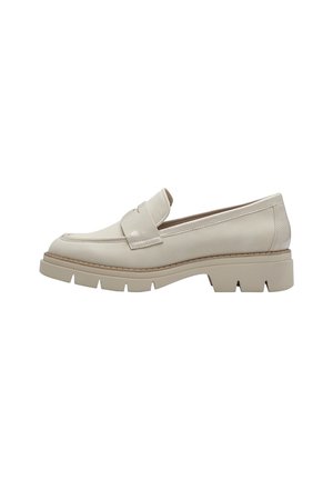 Beige læderloafer med robust slidssål og remdetalje, designet til afslappet eller formelt brug.
