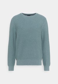 Maglione azzurro chiaro a maglia con collo tondo, maniche lunghe e polsini a coste. Un motivo testurizzato copre tutta la superficie.