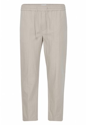 Vaaleanbeiget pellavahousut, joissa on joustava vyötärö, nyöriyksityiskohta ja kapenevat lahkeet. Housuissa on tasainen pinta ilman näkyviä kuvioita.