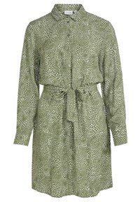 Grön långärmad skjortklänning med oregelbundet vitt prickmönster och knytbart midjebälte.