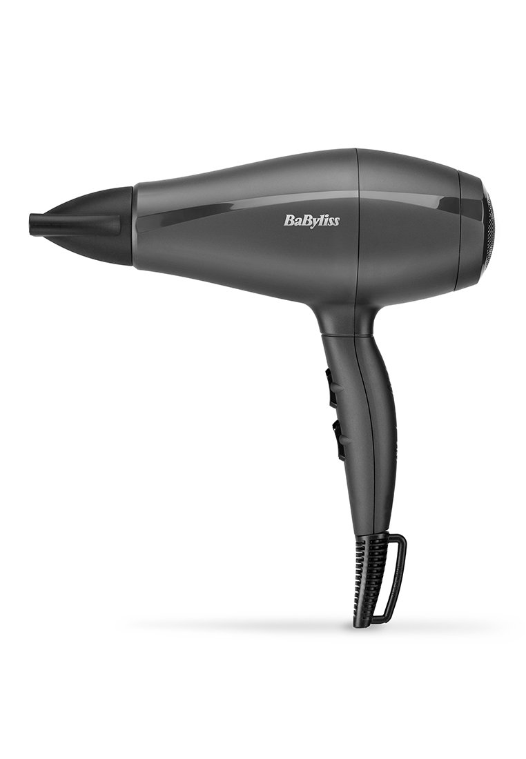 Suszarka do włosów o eleganckiej, szarej plastikowej obudowie, wydłużonym kształcie, zwężającej się końcówce i bocznym uchwycie z przyciskami do ustawiania prędkości i temperatury.