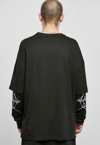 9N1M SENSE GOTH - Bluză cu mânecă lungă - black