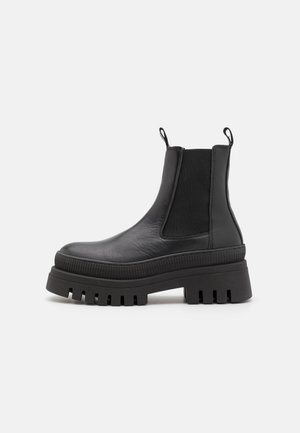 Platform ankle boots - black