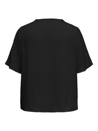 Melna īsām piedurknēm blūze ar teksturētu audumu un vaļēju, kastes formu, redzama no mugurpuses.