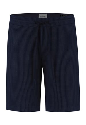 Tmavomodré krátke nohavice z pleteného materiálu s elastickým pásom a nastaviteľným šnúrkou, s označením "Dstrezzed" vo vnútri pásu.