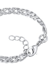 Bracelet en argent avec des maillons entrelacés, comportant un fermoir en homard et une chaîne d'extension réglable pour ajuster la taille.