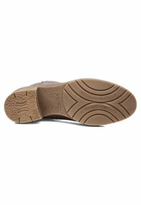 Suola di una scarpa in gomma marrone con un motivo testurizzato, scanalature curve e marchio impresso. Bordo esterno liscio con leggera inclinazione.