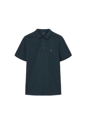 Polo kauluspaita, joka on valmistettu puuvillasta. Lyhyt hiha, kolme nappia edessä ja pieni brodattu logo vasemmassa rinnassa. Klassinen muotoilu.