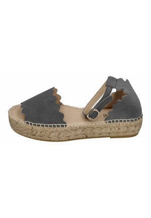 Gray suede espadrille sandal with scalloped edges, ankle strap, and woven jute sole. Flat design, neutral tones, and textured finish.