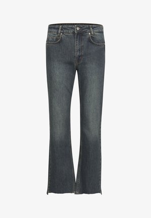 Mørkeblå denimjeans med en let flared pasform og frynset kant. Har fem lommer og kontrasterende syninger på sømmene.