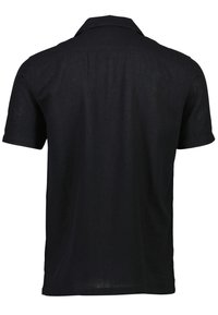 Polo shirt nera in lino a maniche corte con colletto classico, caratterizzata da una superficie liscia e da un taglio dritto all'orlo.