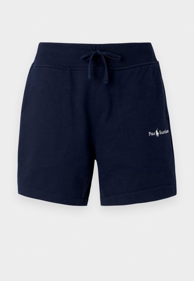 Mørkeblå bomullsshorts med elastisk midjebånd, snøring, sidelommer og brodert logo på venstre bein. Glatt tekstur.