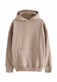 Hoodie beige surdimensionné fabriqué en tissu doux. Il présente une grande poche kangourou, des poignets côtelés et une capuche avec cordon de serrage. Texture lisse.