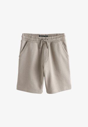 Heledat beežid lühikesed püksid pehmest kangast, millel on elastne vöökoht paelaga, kaks küljetaskut ja mugav lõige.