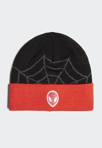 Berretto nero lavorato a maglia con motivo di ragnatela grigia e un risvolto rosso. Patch con logo di un ragno bianco sul davanti. Texture morbida.