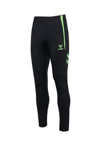 Pantalon de sport noir avec des bandes latérales vert néon, des accents en chevron, une taille élastique et un petit logo "hummel" sur la cuisse supérieure.