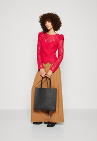 Morgan TYRO - T-shirt à manches longues - fuchsia